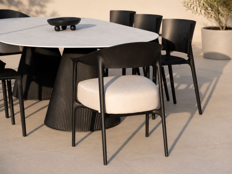Vondom Gatsby Oval Dining Table and Vondom Africa Upholstered Dining Arm Chairs and Side Chairs